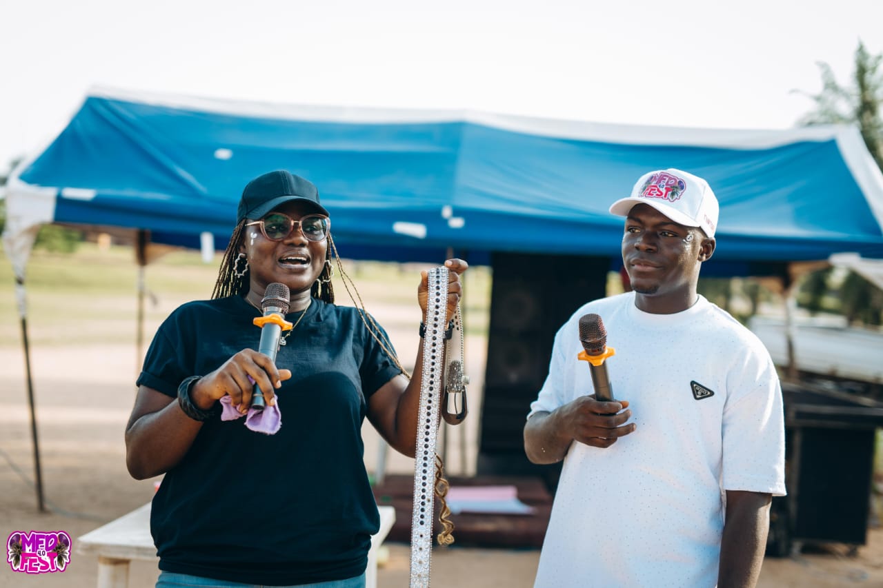 MedFest entertainers holding microphones